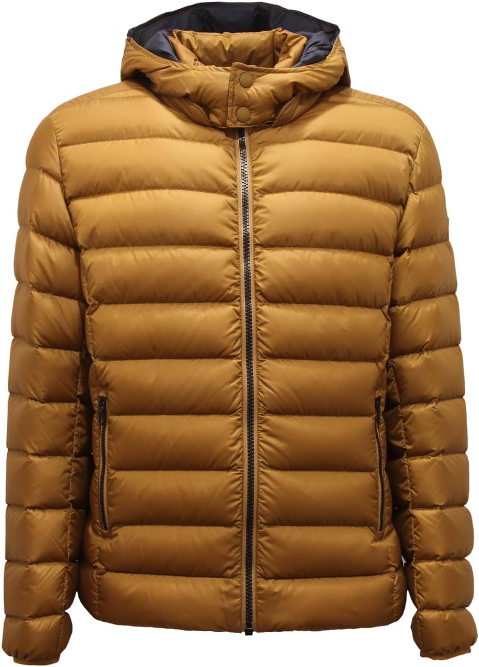 Pavo Monitor Arm mounted on a modern office desk